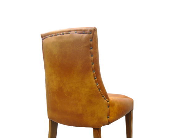 VIP Dining-Chair, a luxurious and stylish seating option that combines genuine or PU leather upholstery with a solid wood frame.
